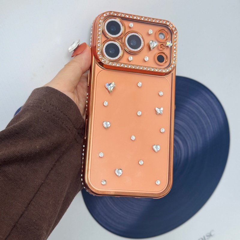 手作りの宝石で飾られたクリスタルメッキのオレンジ色のiPho - Body Jewels のレビューと価格
