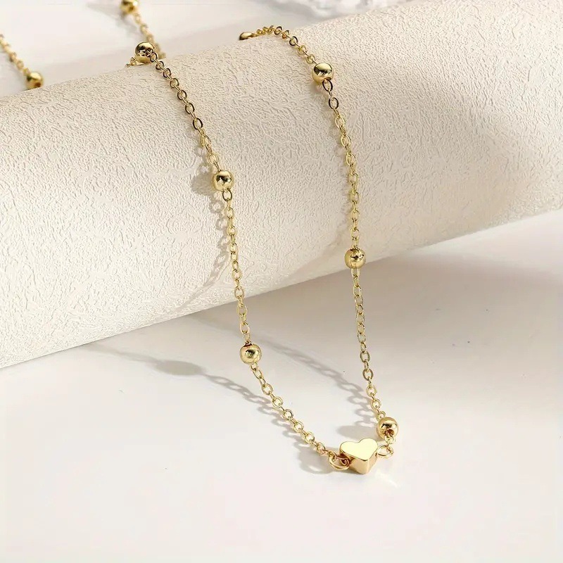 繊細なゴールドのハート型ウエストチェーン、ビーズ付きのボディ - Body Jewelry In Bulk のレビューと価格